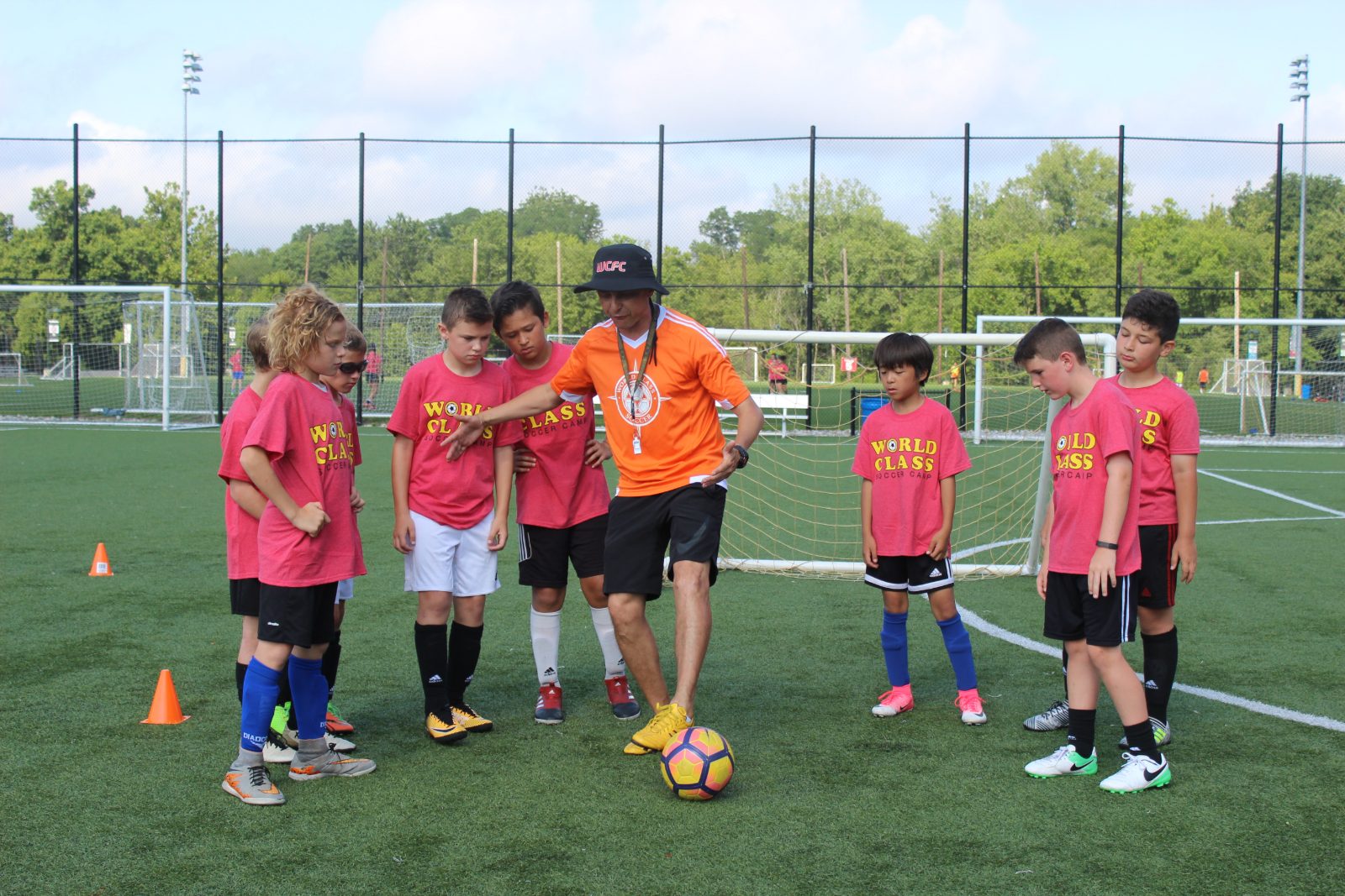 World Class coach instructing campers