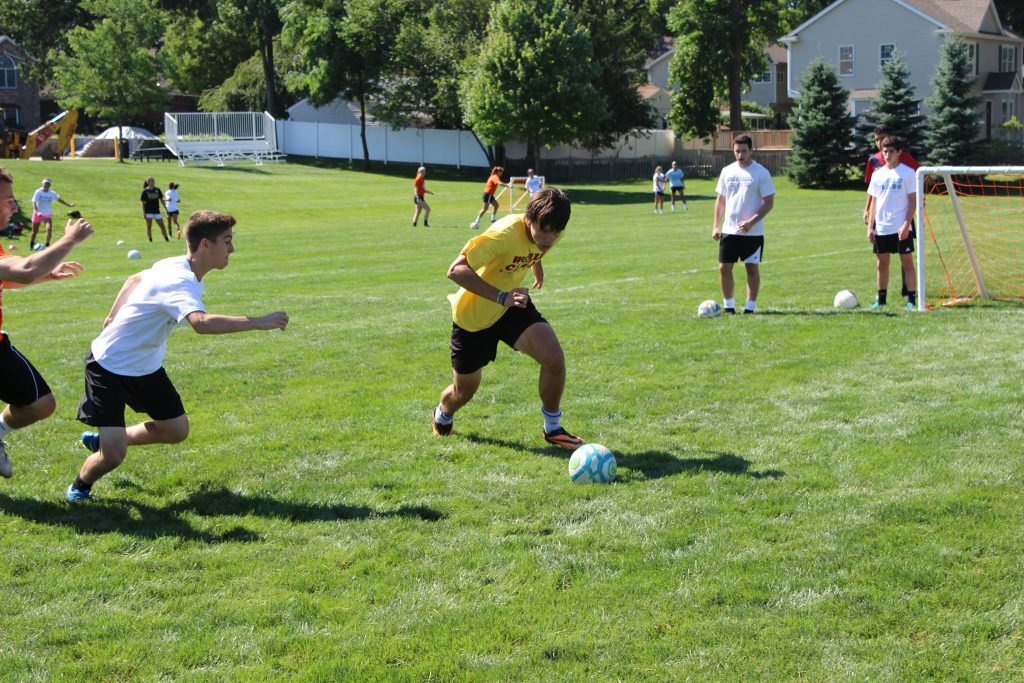 World Class campers in a dribbling drill